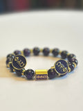 Omega psi phi Bracelet and cufflinks purple and gold ￼