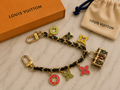 Black and gold LV Bag Charm